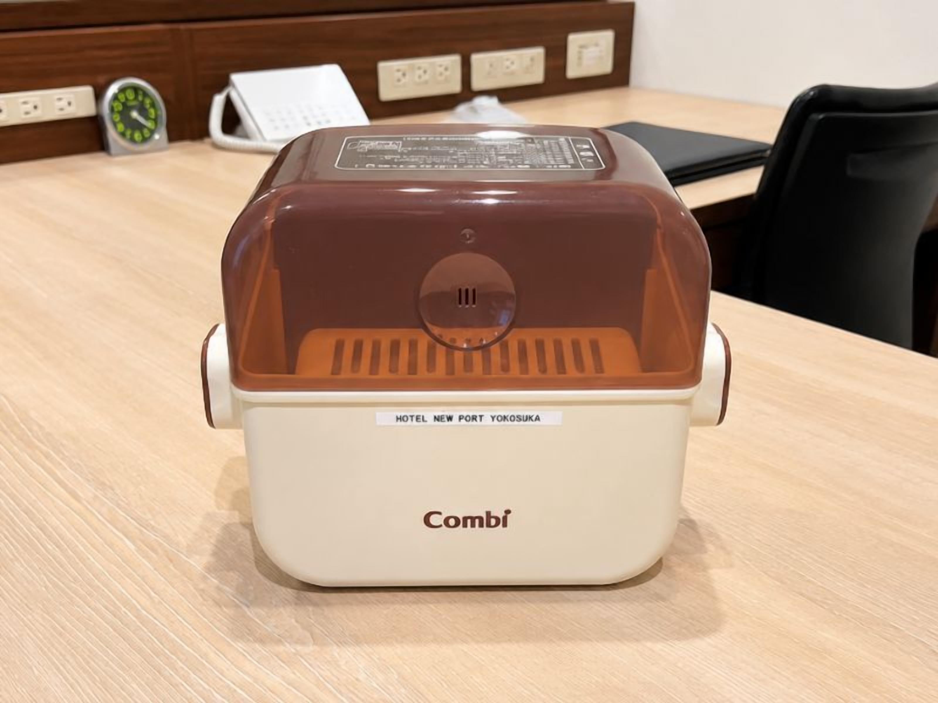 A combi microwave in a hotel room.
