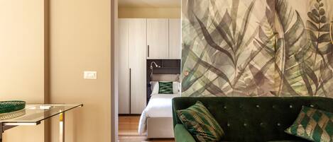 Apartment, 1 Bedroom | Living area | Flat-screen TV, heated floors