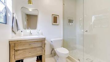 Shower, eco-friendly toiletries, hair dryer, towels