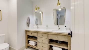 Bathtub, hair dryer, towels