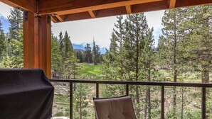 A balcony with a view of a forest and a golf course. - Woodwinds 1265 Luxury Townhouse, Private Hot Tub, 2 Car Garage by RedAwning (Mammoth Lakes)