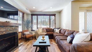 Townhome, 4 Bedrooms | Living area | Smart TV, fireplace, offices