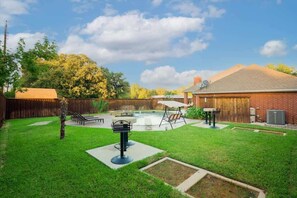 Outdoor dining - Impressive 5BR/3.5B Home with Pool, Game Room & Cinema Room (Irving)