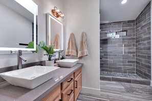Bathtub, hair dryer, shampoo