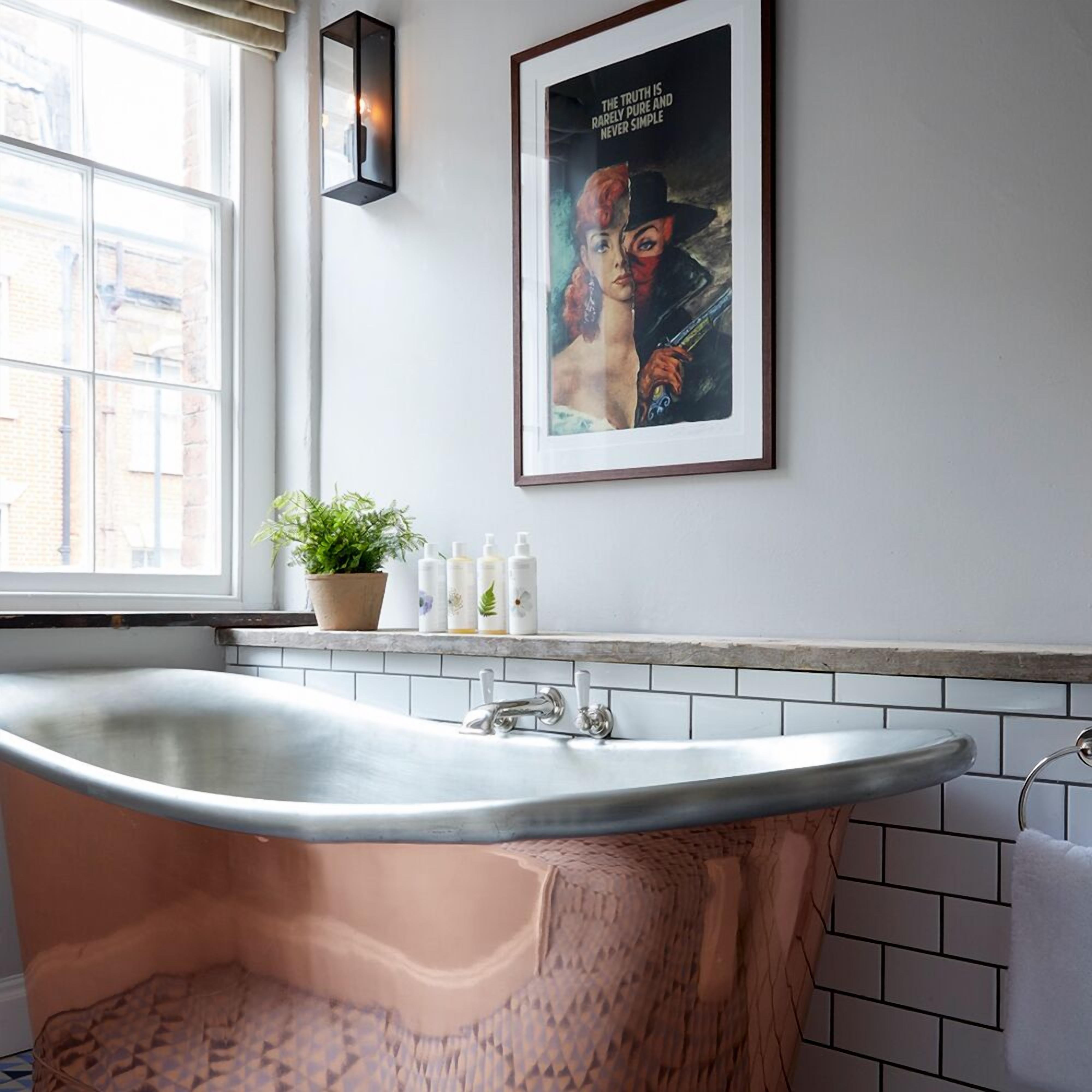 luxury loft | bathroom | eco-friendly toiletries, hair dryer, bathrobes, slippers