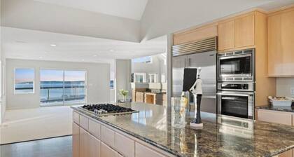 Relaxing in an Entire 5,400sf Beach View Home With Indoor Heated Swimming Pool.