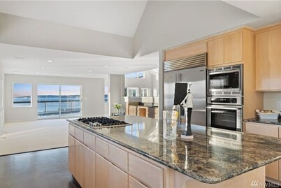 Relaxing in an Entire 5,400sf Beach View Home With Indoor Heated Swimming Pool.