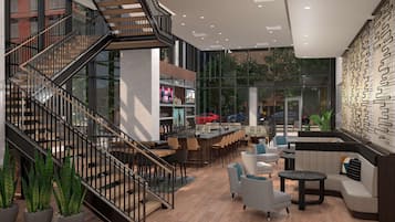 Ein modernes Interieur mit Treppe, Sitzgelegenheit, Bar und großen Fenstern.