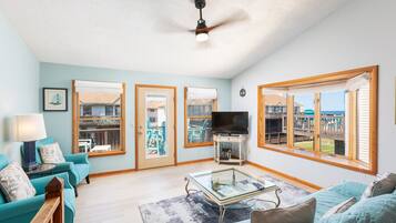 Télévision, cheminée, baby-foot