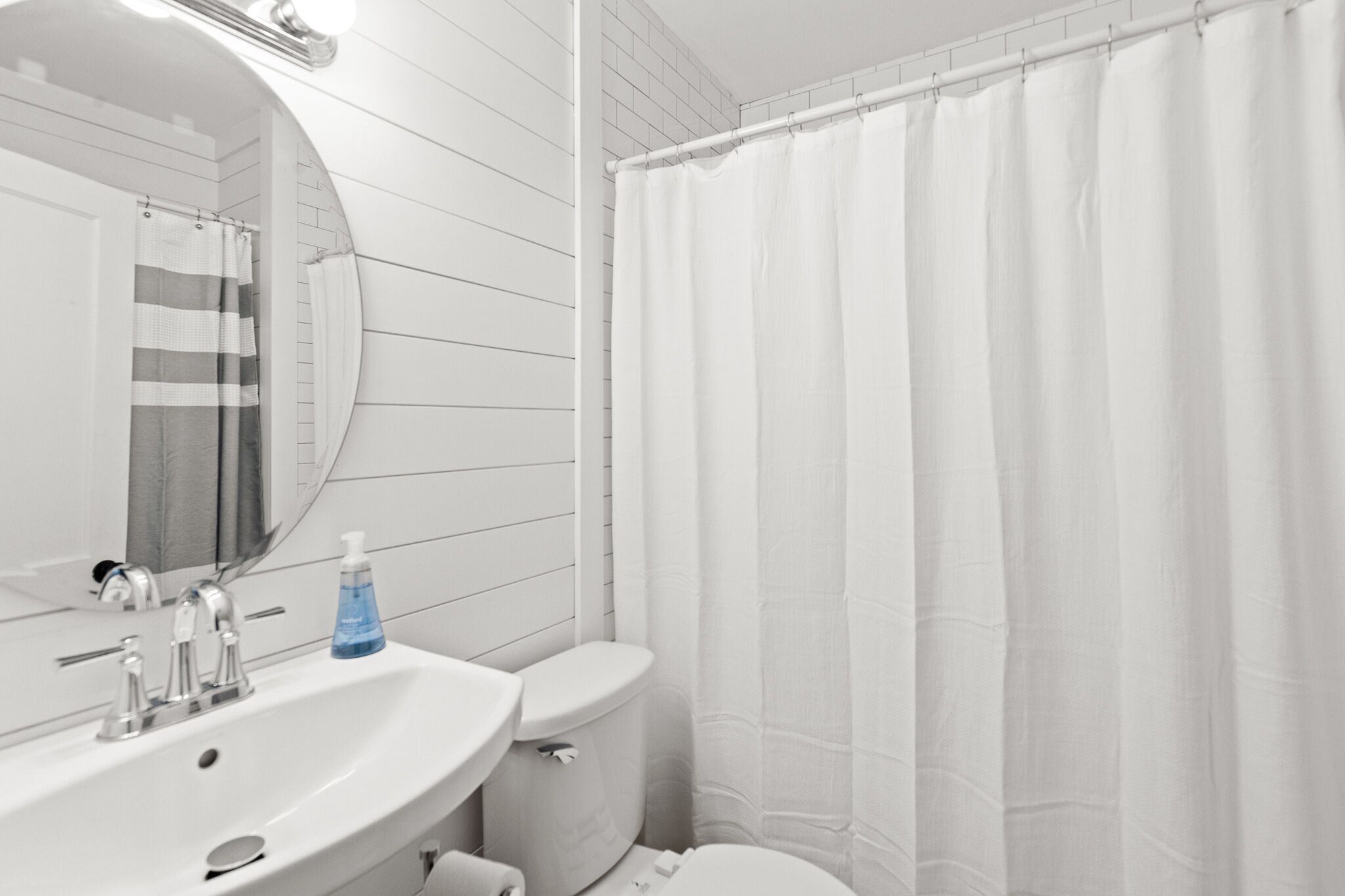 Combined shower/tub, hair dryer, towels, soap
