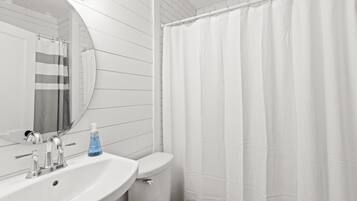 Combined shower/tub, hair dryer, towels, soap