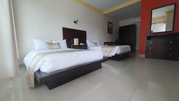 Quadruple Room | Blackout drapes, iron/ironing board, free WiFi, bed sheets