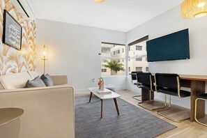 2 Bedroom | 1 Bathroom | Living area | 50-inch Smart TV with digital channels, TV, Netflix - Roami at The Carmela (Miami Beach)