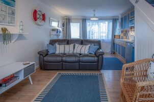 Chalet (2 Bedrooms) | Living area | 32-inch TV with cable channels