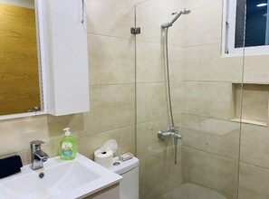 Hair dryer, towels, soap, toilet paper