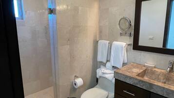 Shower, hair dryer, towels, soap