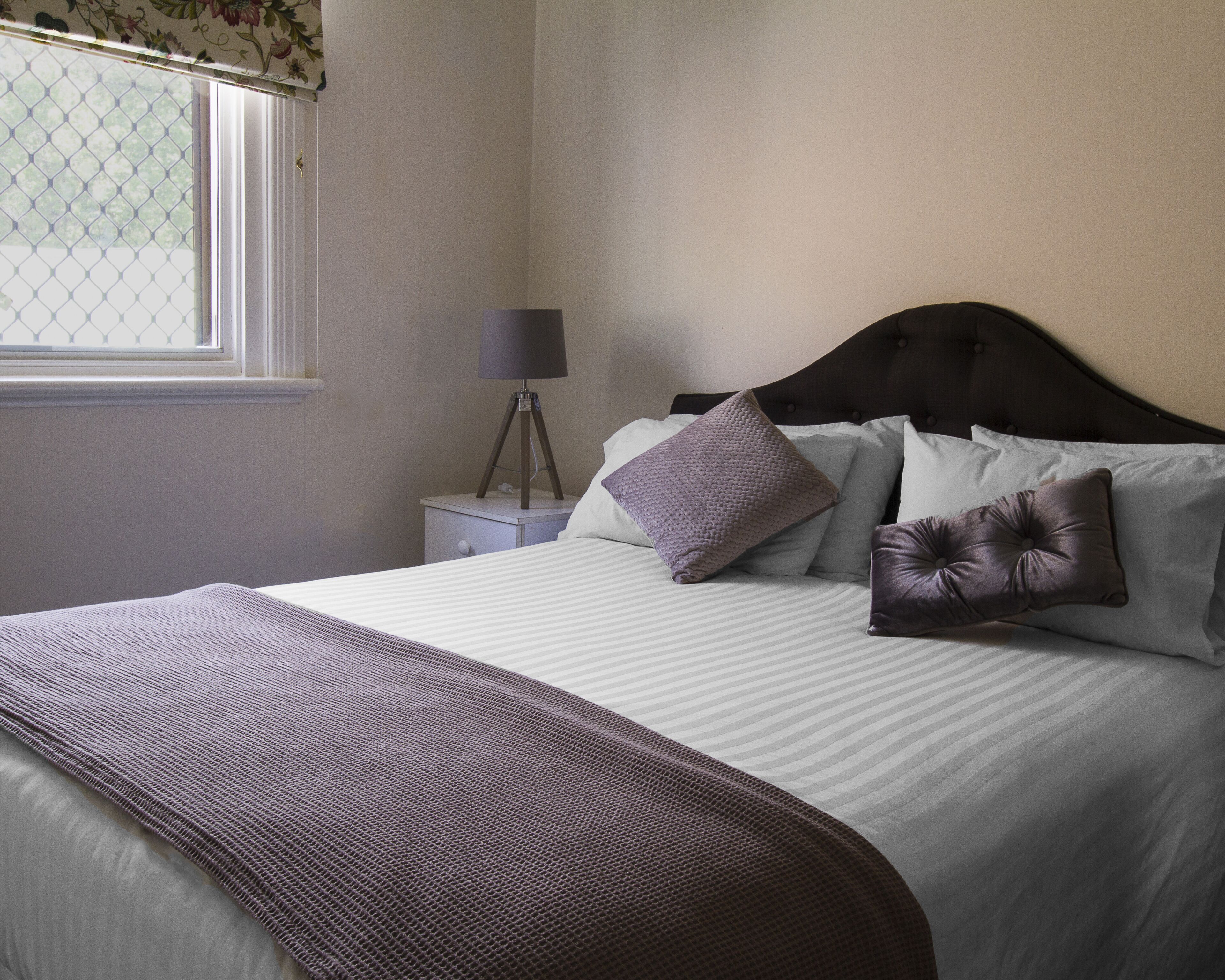 Basic Double Room, 1 Queen Bed, Shared Bathroom | Individually furnished, iron/ironing board, free WiFi