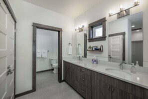 Combined shower/tub, hair dryer, towels, soap