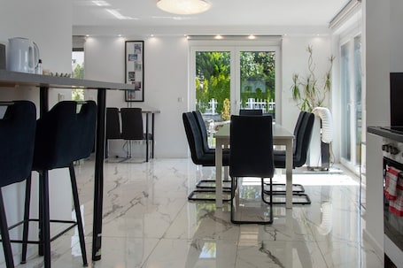 Dining. Luxury New-Build Villa with Garden, Terrace, Air Conditioning, and Wi-Fi