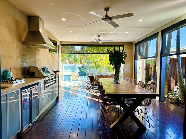 Fridge, microwave, oven, stovetop - The Palm - Beachside Home with Heated Pool, Cinema & Games Room (Mudjimba)