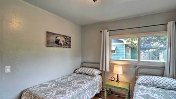 2 bedrooms, blackout curtains, iron/ironing board, travel cot