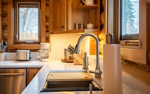 Fridge, microwave, oven, stovetop - Cozy Cody Cottage located in the heart of downtown Cody! (Cody)