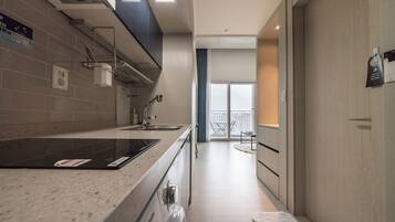 Fridge, microwave, electric kettle, cookware/dishes/utensils