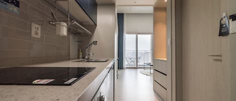 Fridge, microwave, electric kettle, cookware/dishes/utensils