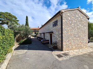 A stone building with a sign indicating it is a guesthouse. - House 2134/45311 (Istria - Vidulini), 18000m from the beach (Vidulini)