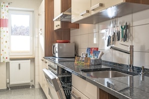 Fridge, dishwasher, coffee/tea maker, electric kettle