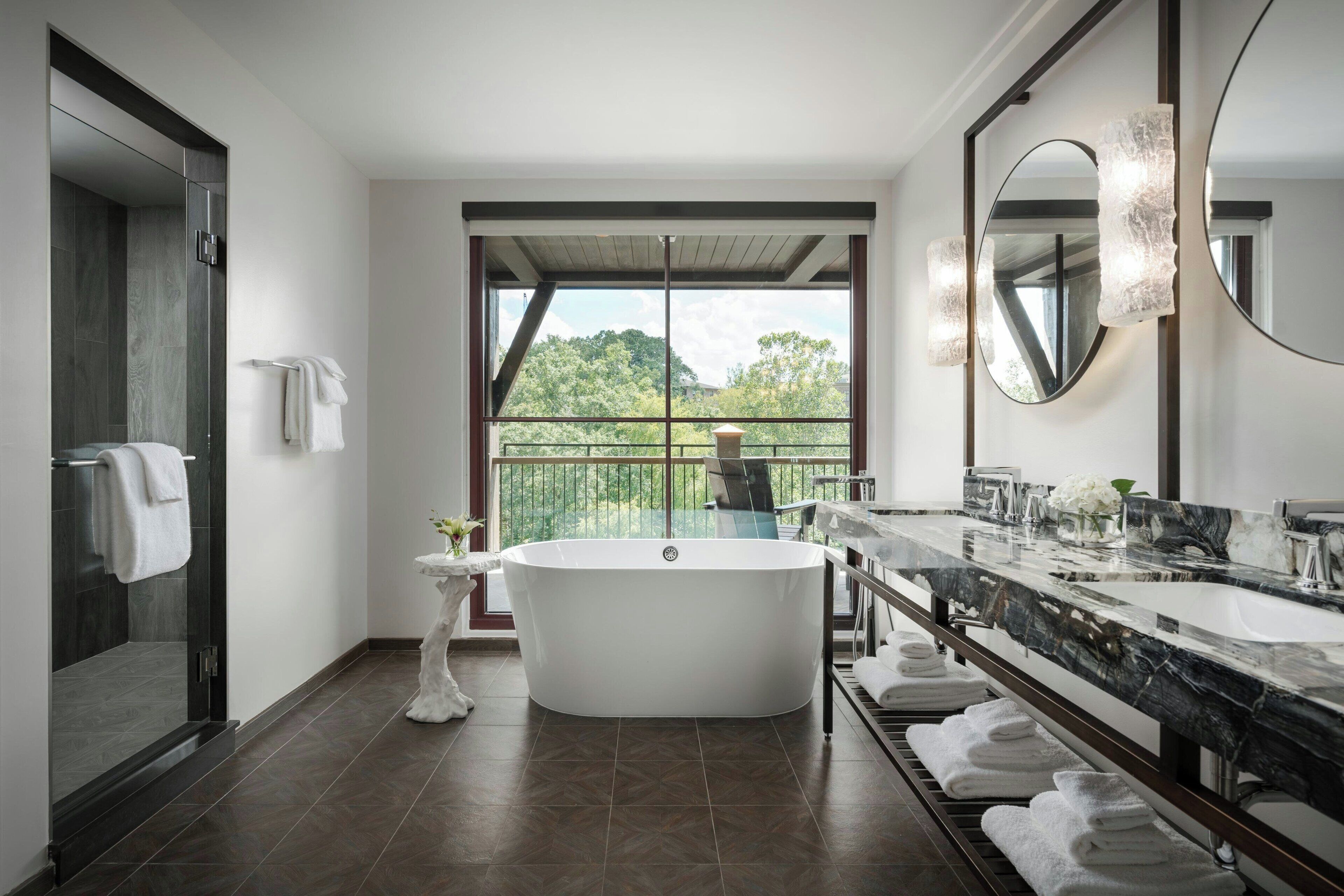 junior suite, 1 king bed, corner | bathroom | shower, rainfall showerhead, free toiletries, hair dryer