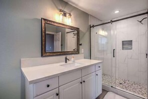 Shower, hair dryer, shampoo