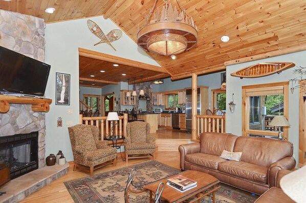 Cheminée, lecteur de DVD, table de tennis de table