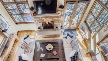 Flat-screen TV, fireplace, foosball, offices