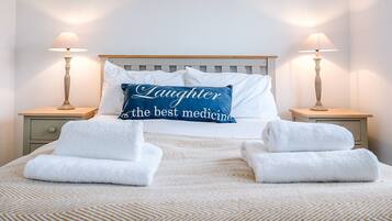 2 bedrooms, laptop workspace, iron/ironing board, travel crib