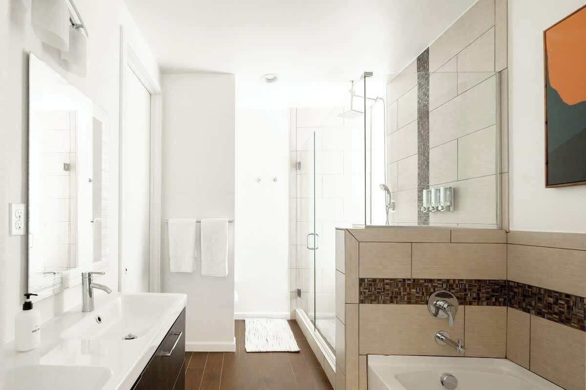 Shower, hair dryer, towels, shampoo