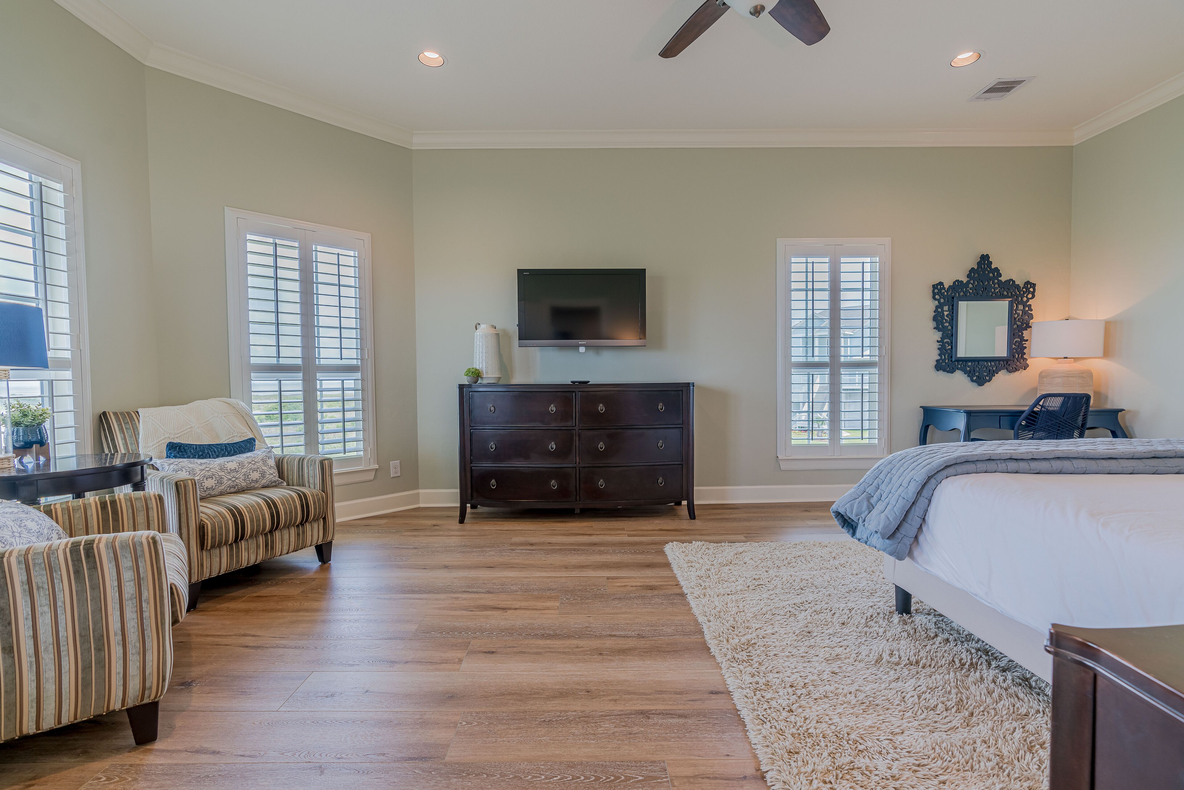 Primary suite features desk for dedicated work space 