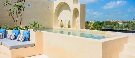 Outdoor pool, open 7:00 AM to 11:00 PM, pool loungers