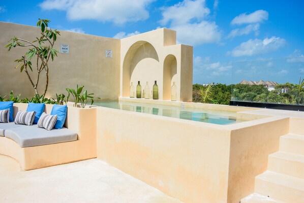 Outdoor pool, open 7:00 AM to 11:00 PM, pool loungers
