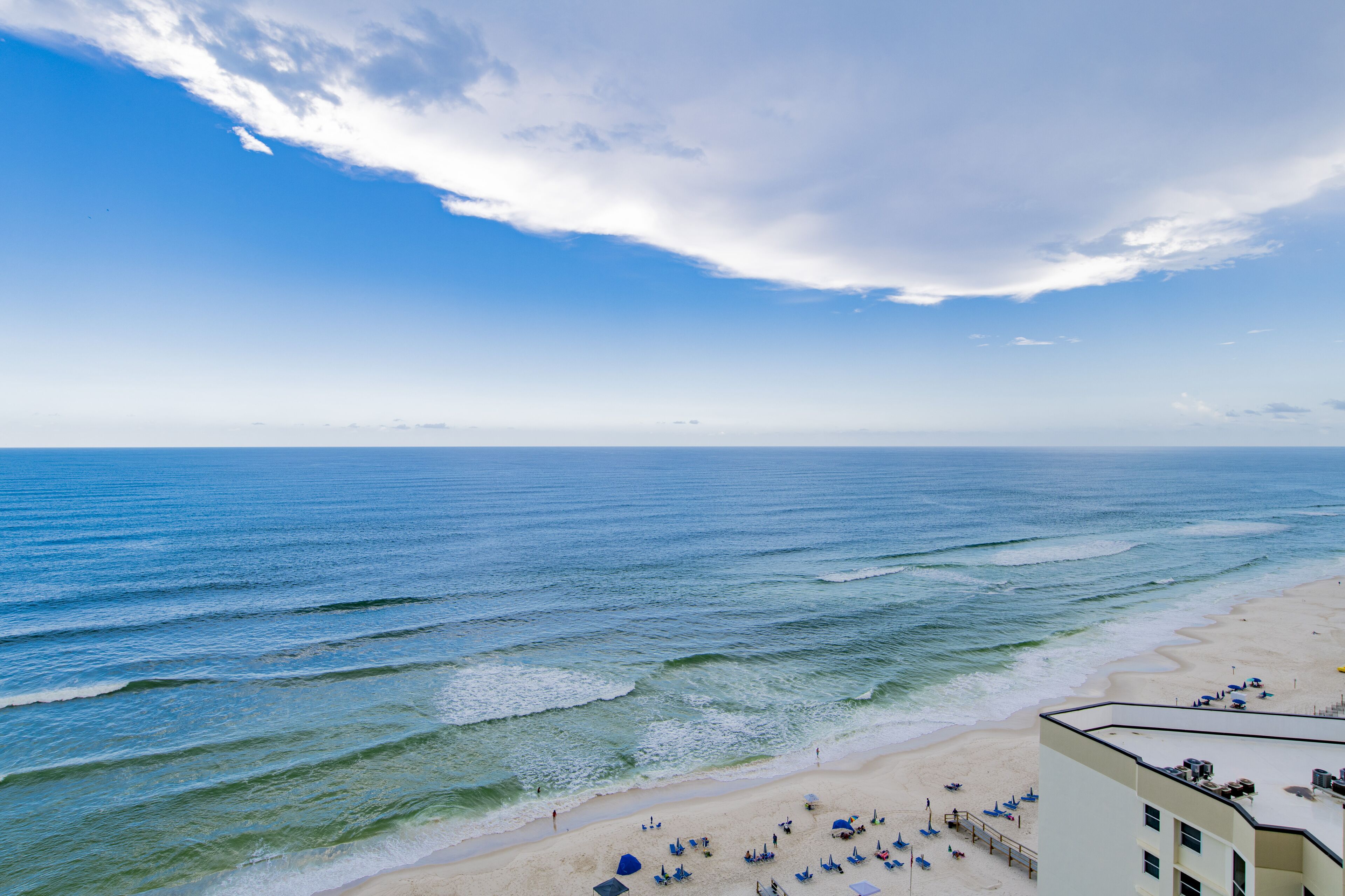 On the beach, sun-loungers