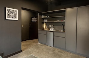 Mini-fridge, microwave, electric kettle, toaster