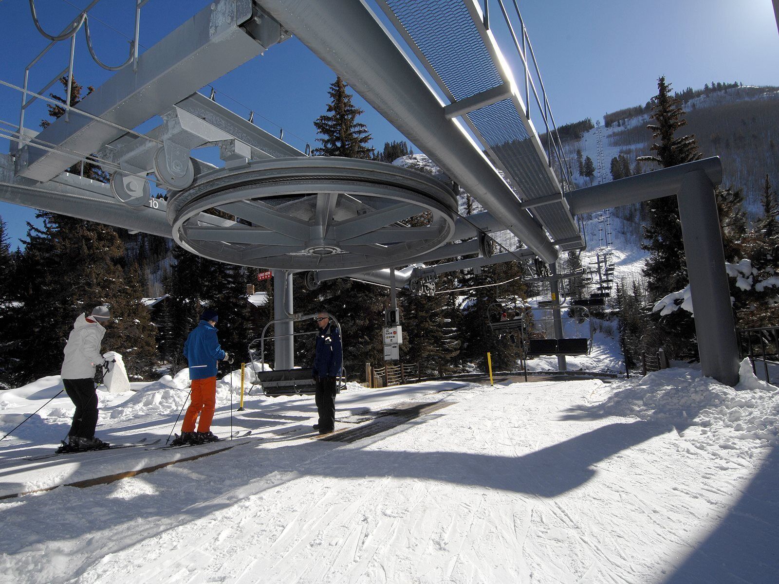 A ski lift with a circular platform and metal supports.