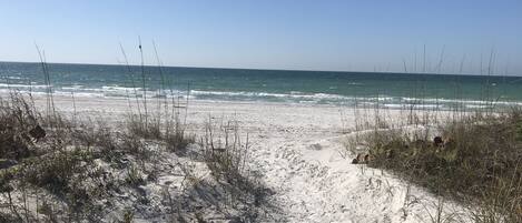 On the beach, sun-loungers, beach towels