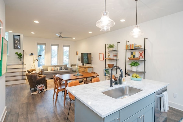 2nd floor has open-concept kitchen/dining/living