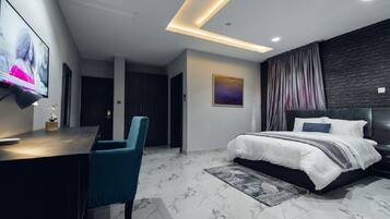 Suite ejecutiva | Wifi gratis y ropa de cama