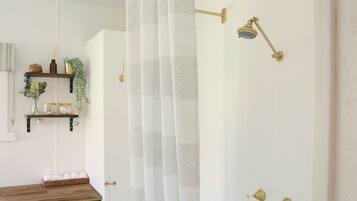 Combined shower/bathtub, hair dryer, towels, soap