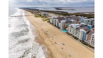 On the beach, sun loungers, beach towels