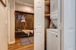 Entryway Hallway with laundry closet and convenient mud-bench with equipment hooks, baskets, and boot mats - Heart of Park City + Hot Tub/Sauna: Park City Lift Line 207! (Park City)