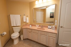 Combined shower/tub, towels, soap, toilet paper