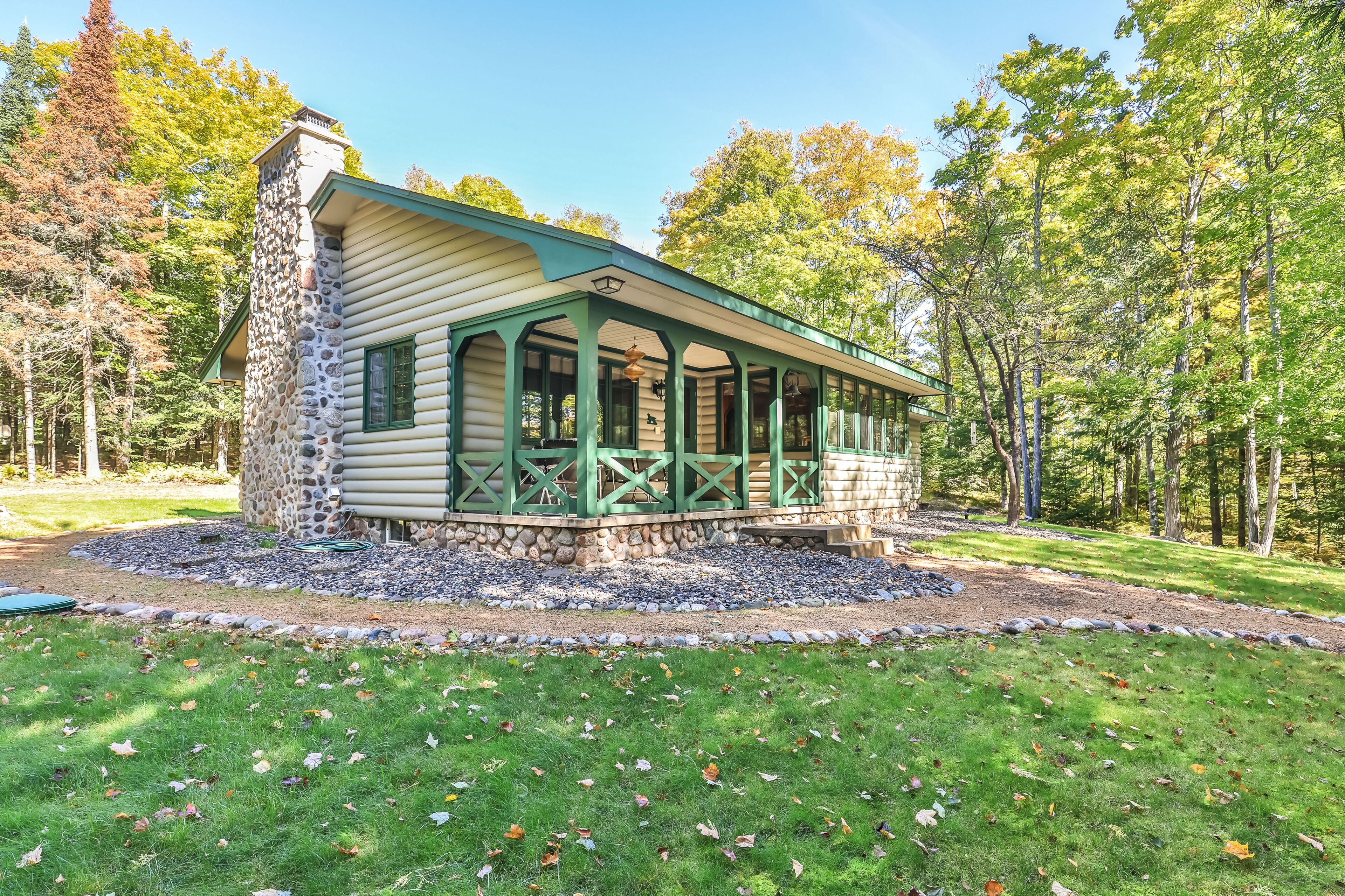 Lakefront cabin with water view, firepit, full kitchen, & furnished deck